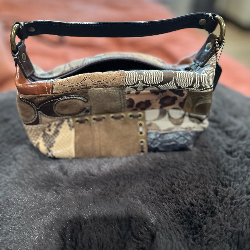 Coach Signature sufflette leather handbag
Coach Brown in Leather -